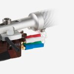 Clearaudio CONCERTO V2 Within this satin wood body the technology is outstanding, housing 24-carat gold coils and a patented eight-magnet array unique to our V2 range. Further champion-level ingredients are the boron cantilever and Micro HD stylus. A recipe to win the trophy of sound championship. With a dynamic range of up to 70 decibels and a total weight of only seven grams, the MC Concerto V2 qualifies itself for the top league of moving coil cartridges.