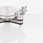 Clearaudio Innovation In the world of turntable construction the Innovation is the ultimate technological prototype. An infrared sensor combined with Clearaudio's optical speed control (OSC) ensures an outstanding level of speed stability – a prerequisite for optimal listening. A high-torque decoupled DC motor effortlessly rotates the precision-machined 70mm-thick platter made of high-density acrylic. The platter rotates in a virtually frictionfree environment atop the 15mm-thick stainless steel sub platter, thanks to Clearaudio's patented ceramic magnetic bearing (CMB). A convenient choice of three rotational speeds is also at your fingertips, and it is possible to install a second tonearm.