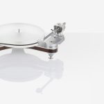 The Clearaudio Innovation Basic provides the main technical characteristics of our Innovation, in a reduced "Basic" design that rivals it's larger siblings. Perfectly matched materials meet patented Clearaudio technology. The 38mm-thick platter of the Innovation Compact consists of dynamically balanced polyoxymethylene (POM) and is powered by a high-torque DC motor with precision bearings, developed exclusively for Clearaudio. The optimally designed chassis keeps resonances out of the audible range and guarantees maximum stability in a housing made of a massive panzerholz (bulletproof wood) and aluminum sandwich. Timeless design with quality built to last for decades. The option to mount a second tonearm makes it possible to play a rich variety of music from across the decades.