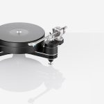 The Clearaudio Innovation Compact turntable with its very efficient design is nothing less than an audiophile revelation. Thanks to optical speed control (OSC), speed stability values are obtained that lift this turntable into the global highend class. Perfectly matched materials meet patented Clearaudio technology. The 70mm-thick platter of the Innovation Compact consists of dynamically balanced polyoxymethylene (POM) and is powered by a high-torque DC motor with precision bearings, developed exclusively for Clearaudio. The optimally designed chassis keeps resonances out of the audible range and guarantees maximum stability in a housing made of a massive panzerholz (bulletproof wood) and aluminium sandwich. Timeless design with quality built to last for decades. The option to mount a second tonearm makes it possible to play a rich variety of music from across the decades.
