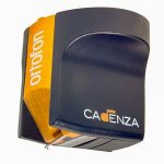 Ortofon Cadenza Bronze stereo imaging capabilities illuminate the farthest corners of the soundstage in all three dimensions. Cadenza Bronze is a true high-end reference cartridge, conveying music with supreme precision, impact and dynamics. The Cadenza Bronze model is using a Replicant 100 stylus and a conical aluminium cantilever. The coil wire is the famous Ortofon Aucurum wire, which is a gold plated 6NX copper wire. Field Stabilizing Element/FSE, is used for optimal linearity especially during complex crescendo passages.