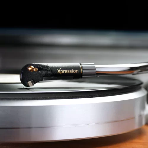 Ortofon Xpression The state of the art product, the Ortofon Xpression represents a combination of three elements very characteristic for Ortofon. The cutting edge SLM materials technology pioneered by the MC A90 and SPU 90th Anniversary Modification of the generator system introduced with the MC A90 and the MC Windfeld Ortofon design tradition