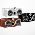 Triangle Signature Gamma Center Channel - Signature Gamma The center channel loudspeaker Signature Gamma has been exclusively developed for creating a complete Signature home-theater. A key element of a high-end audio/video set-up, the center channel reproduces human voices with clear dialogue. The speaker uses the same technology as the bookshelf and floor standing models and offers a great tonal balance. The Signature Gamma includes 4 drivers: one high efficiency horn-loaded tweeter perfect for home Theater and two 16cm (6.5inch) paper mid-woofer. The paper diaphragm is a great choice of material for reproducing human voices. On the edge of the unit a rolled suspension allows the driver to cover a wide range of frequencies. The port is positioned on the front of the cabinet for easier positioning in the room. It provides a smooth toned balance, perfectly adapted to all types of movies.