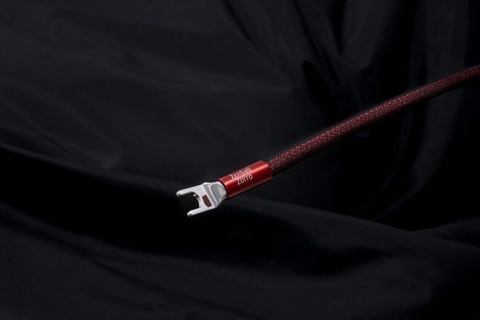 ZenSati Zorro Speaker Cables “I can’t allow myself to be ordinary!” These words spoken by the original mystery hero of them all, were the inspiration for ZenSati Zorro. With outstanding performance in A-B tests and the ability to disappear completely in a true musical illusion, ZenSati Zorro breaks all barriers with its astonishing and absolutely crystal-clear signal, allowing the space between voices and instruments to be readily appreciated. With exceptional attention to aesthetics, ZenSati Zorro is attired in iconic red and black, drawing you into a universe of superlative performance never seen before in its league. ZenSati Zorro ensures any music lover admission to the ultimate emotional pleasure available only from the finest available audio technology. ZenSati has earned a well-deserved global reputation for spectacularly executed tonal integrity, timbral solidity and musical wholeness. ZenSati Zorro cables consist of twisted, smooth, silver-plated copper conductors, properly insulated and assembled using only the finest materials. Comprehensive materials research has revealed the value of not using a pure silver conductor, as it does not provide an optimal path for signal transmission. In the proper proportions, the combination of copper, plated with a solid layer of pure silver, ensures ideal conditions for unimpeded signal transmission.