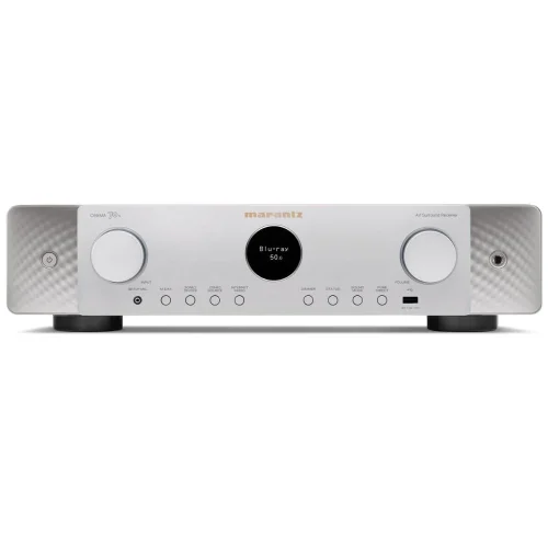 Marantz CINEMA 70s Slimline 7.2 Performance, Technology and Slim Design The CINEMA 70s is a multi-talented, slim-line AV amplifier. With 7.2 channels and 50 Watts per channel, Dolby Atmos, DTS:X and 8K Ultra HD as well as the well-known HEOS network platform for multiroom connectivity. It looks discreet in appearance, but remains an AV receiver with high capacity. · Slim Design · 7.2 Channels · 50 Watts per Channel · 6 HDMI Inputs and eARC · 8K & Dolby Atmos · HEOS Built-in The CINEMA 70s features the latest immersive audio formats, 8K video, room acoustic optimization, streaming and more technologies to simplify and elevate your enjoyment. Performance The CINEMA 70s has been meticulously engineered by Marantz’s global Sound Master team for outstanding performance with our exclusive HDAM amplification circuit to create the most Musical Sound in your home! Slim Design and Style Excellence is heard and seen. The CINEMA 70s’ sleek design makes it less than half the height of many receivers, yet the design remains luxurious with every element carefully selected. Tailored to your preferences Multiple connection options and precise adjustment of settings allow you to configure the CINEMA 70s exactly how you want it. Easy to operate and install The included remote control, easy front panel settings and intuitive on-screen setup process make you feel like an expert user right away. Compatibility Six HDMI inputs, plus digital, analog and phono inputs, as well as speaker and preamp outputs ensure connections to any other device you may have.