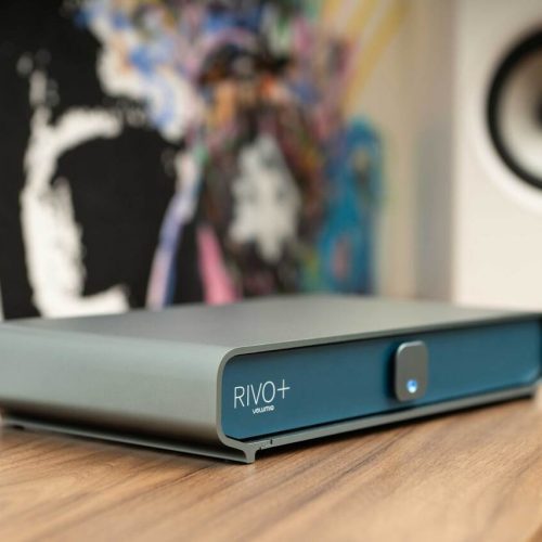 Volumio Rivo Plus The Rivo Plus builds on the acclaimed Rivo model, now featuring a dedicated ASIC for enhanced S/PDIF and AES-EBU outputs and upgraded MEMS clocks in the USB HUB IC. This delivers pure digital sound and seamless connectivity for audiophiles. OPTIMIZED CLOCK STABILITY Upgraded MEMS clocks in the USB HUB IC enhance reclocking and signal integrity at the USB DAC port, ensuring superior jitter stability and consistent audio quality I2S/DSD OVER HDMI CONNECTIVITY ADDED I2S/DSD over HDMI interface offers optimal sonic performance for some external DACs compared to S/PDIF, AES-EBU, and USB DEDICATED SUPPORT One-on-one support to help with everything from set-up to troubleshooting. Always available for you! THE ULTIMATE DIGITAL TRANSPORT The Rivo+ is the enhanced version of our award-winning Rivo digital transport. Engineered based on user feedback, Rivo+ elevates the already excellent qualities of the original. Key upgrades include a dedicated ASIC for cleaner S/PDIF and AES-EBU outputs, improved MEMS clocks for lower jitter, I2S over HDMI connectivity for compatible high-end DACs, and a 12V trigger to power on/off other components. If you demand the pinnacle of digital transport performance, the Rivo+ is the solution. ENHANCED AUDIO VIA I2S/DSD OVER HDMI FOR DISCERNING LISTENERS The Rivo+ features a dedicated ASIC to generate the S/PDIF and AES-EBU output signals, offloading this crucial task from the CPU. This specialized integrated circuit is designed to produce these digital output signals with uncompromising precision, free from any potential interference or jitter introduced by the main processor. Powering this dedicated ASIC is a high-quality MEMS (Micro-Electro-Mechanical Systems) clock, which provides an exceptionally stable and low-jitter timing reference. Coupled with low-noise voltage regulators, this enhancement to the RIVO+ ensures the output signals maintain the utmost purity and refinement. ENJOY MUSIC FROM YOUR FAVORITE SOURCES Rivo+ lets you stream from your favorite music services Bring your content from local or network-attached drives and play internet radio ENGINEERED FOR SIGNAL PRECISION Upgraded MEMS clocks in the USB HUB IC enhance reclocking and signal integrity for Rivo+ especially when connected to the USB DAC port. This delivers exceptional jitter and frequency stability, reducing susceptibility to temperature changes and aging for consistently high-quality audio output. EASY SETUP Getting started just takes a couple of minutes with the Volumio official iOS and Android apps MADE IN ITALY All Volumio products are proudly designed and assembled in Florence Italy ROON READY All Volumio products are Roon Ready certified by Roon Labs. This allows seamless integration with Roon system and guarantees the use of Roon streaming technology with Volumio Primo, without compromising high audio performance. MULTIPLE CONNECTIVITY OPTIONS TO EXPLORE S/PDIF and AES-EBU outputs generated by a dedicated ASIC with low-noise power supply + I2S/DSD over HDMI interface for optimized connection and enhanced audio performance. VOLUMIO PREMIUM BUILT IN On board, the Rivo+ is the latest version of Volumio – Volumio AI- that incorporates Supersearch an AI-powered search function that is meant to optimize your music discovery. Volumio OS comes with a Multi-room capability that creates an integrated environment with other Volumio stations in your home.