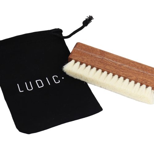 LUDIC Wooden Brush Vinyl Goat. Made from wood and natural goat hair, this anti-static brush is ideal for removing dust and other debris that can settle in the grooves of a vinyl record. Naturally anti-static bristles prevent static build-up. Wooden handle.