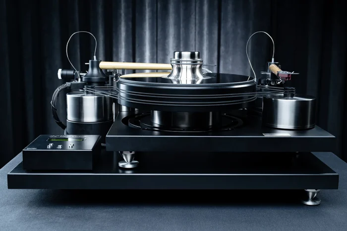 J.Sikora Turntables - Initial MAX Hi End turntable from J.Sikora, the Initial Line MAX is the company's introductory model but here in the MAX version with all possible upgrades incorporated, with total weight [kg]: 51, platter weight [kg]: 4, platter material: Delrin®, made of aluminum, inox and cast iron. Bearing type: ceramic ball - inverted, with 2 DC motors, rubber belt, possibility for 2 arms, arm board, Clamp, glass mat, external power supply available in silver or black.