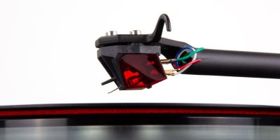 REGA ANIA PRO The latest member of our Rega MC cartridge range the Ania Pro uses our advanced Vital profile nude diamond stylus. This profile is designed to extract as much detail from the vinyl surface as possible. The Ania Pro delivers tight bass warm mid-ranges and accurate top end frequencies to offer a well balanced and detailed performance.

Listen like a Pro
Using our unique hand-wound micro coil found in the rest of the MC range, the Ania Pro is housed in a unique PPS highly rigid body, ensuring accurate construction and Rega’s three point fixing method which offers the optimum connection to the head-shell while automatically setting overhang. The new body is protected by a CAD designed, red rigid cover to protect the internal fine wires, making handling when fitting, safe and risk free. The Ania Pro features a super high-powered, neodymium magnet and a coil meticulously hand wound on to an iron micro cross. This miniature assembly allows us greater freedom to track the vinyl groove guaranteeing even more detail is extracted from the vinyl. All of these features combine to deliver a balanced and dynamic performance that will engage you with your vinyl like never before. The Ania Pro is the perfect partner for the Planar 6 and Planar 8 turntable with a factory fitted option available for both. Please ask your retailer for details.

REGA ANIA PRO Key Features
Vital profile nude diamond
Aluminium tapered cantilever
Iron micro cross assembly
One of the worlds smallest MC generators
Cutting edge high power Neodymium magnets
Coil constructed from 0.018 mm fine wire
Lifetime warranty against manufacture defects