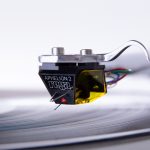 REGA APHELION 2 Aphelion 2 is the 4th generation of our unique handmade moving coil cartridges. Taking the technology developed from the original Aphelion and the latest Apheta 3 to the next level, our engineers have now fine-tuned every aspect of the original designs. The Ultimate in Micro Engineering and Design The Aphelion 2 is the ultimate in micro engineering and design. Our unique hand-wound micro cross and coil assembly is built directly onto a Boron rod cantilever. The advanced ‘fine line’ profile nude diamond is then mounted through 90 degrees which offers extreme levels of stiffness and control over the stylus. This design requires a ‘zero tolerance’ approach to engineering to achieve the highest level of performance from a Rega cartridge to date. Designed to complement the reference range of Rega turntables including the Naiad. APHELION 2 Key Features Graded zero tolerance black anodised aluminium body Boron rod cantilever ‘Fine line’ profile, nude diamond stylus Iron micro cross and coil assembly making one of the worlds smallest MC generators Worlds most powerful minaturised neodymium magnet High specification fine wire 0.018 mm Lifetime warranty against manufacture defects