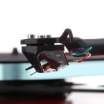 REGA Ania REGA Ania Welcome to the world of moving coils Rega’s Moving Coil cartridge design is unique in its approach to achieving an ultra-low mass generator which is undamped (no tie wire) using a unique rhomboid pivot for the cantilever powered by a purpose designed, exclusive to Rega, Neodymium magnet system. This type of design requires a zero-tolerance engineered cartridge body which is Rega’s area of expertise and with the Apheta 3 and Aphelion 2 products these bodies are machined from one piece of the highest quality aluminium. This is a difficult and expensive process requiring all of Rega’s years of experience to achieve. In particular, the “zero” tolerancing of the body is required in the alignment and dimension of the pivot pad mounting hole and the magnet mechanism mounting hole relationship.