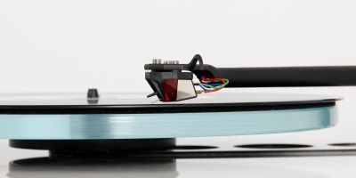 REGA Nd3The all new Nd3 moving magnet cartridge was developed over 10 years and promises to deliver ‘next level’ performance from moving magnet technology. The Nd range (patent pending) we believe is a world first to use ultra-high powered Neodymium magnets which allow us to create this totally unique design.

Advanced Technology
Each Nd3 is meticulously hand-made by our highly skilled technicians. The stylus profile is a high quality elliptical profile manmade polycrystalline diamond, which is bonded to a round titanium shank. The design uses brand new generator geometry with perfect symmetry to achieve accurate channel balance. The Nd3 also has an optimised pole gap for superior linearity and cross talk characteristics, this provides a far wider soundstage than the previous models. This new cartridge is created with miniaturised parallel coils which are wound in house utilising 38-micron wire with just 1275 turns. This produces a low inductance, low impedance generator giving vastly improved high frequency response. In keeping with our commitment to sustainability, the Nd range is supplied in 100% recyclable packaging.