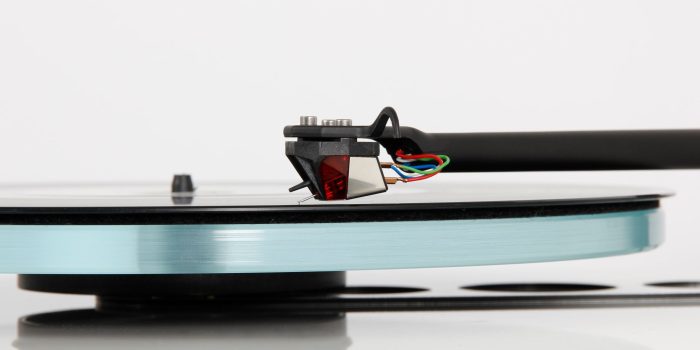 REGA Nd3 The all new Nd3 moving magnet cartridge was developed over 10 years and promises to deliver ‘next level’ performance from moving magnet technology. The Nd range (patent pending) we believe is a world first to use ultra-high powered Neodymium magnets which allow us to create this totally unique design. Advanced Technology Each Nd3 is meticulously hand-made by our highly skilled technicians. The stylus profile is a high quality elliptical profile manmade polycrystalline diamond, which is bonded to a round titanium shank. The design uses brand new generator geometry with perfect symmetry to achieve accurate channel balance. The Nd3 also has an optimised pole gap for superior linearity and cross talk characteristics, this provides a far wider soundstage than the previous models. This new cartridge is created with miniaturised parallel coils which are wound in house utilising 38-micron wire with just 1275 turns. This produces a low inductance, low impedance generator giving vastly improved high frequency response. In keeping with our commitment to sustainability, the Nd range is supplied in 100% recyclable packaging.