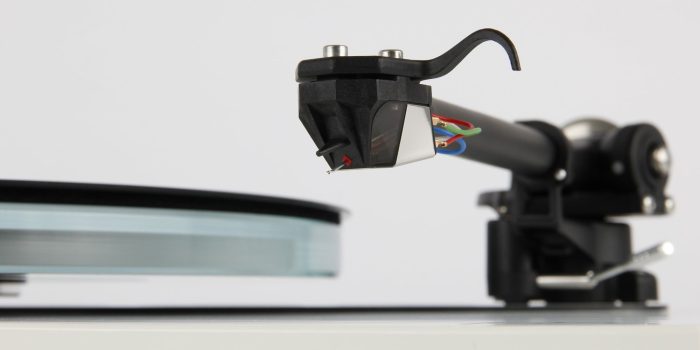 REGA Nd5 The all new Nd5 moving magnet cartridge was developed over 10 years and promises to deliver ‘next level’ performance from moving magnet technology. The Nd range (patent pending) is a world first to use an ultra-high powered Neodymium magnet which allow us to create this totally unique design. Advanced Moving Magnet Each Nd5 is meticulously hand-made by our highly skilled technicians. The stylus profile is a perfect elliptical nude diamond. This is a true ellipse created by an elliptical grinding process made from polycrystalline manmade diamond. The design uses brand new generator geometry with perfect symmetry to achieve accurate channel balance. The Nd5 also has an optimised pole gap for superior linearity and cross talk characteristics. This provides a far wider soundstage than the previous models. This new cartridge is created with miniaturised parallel coils which are wound in house utilising 38-micron wire with just 1275 turns. This produces a low inductance, low impedance generator giving vastly improved high frequency response. In keeping with our commitment to sustainability, the Nd range is supplied in 100% recyclable packaging.