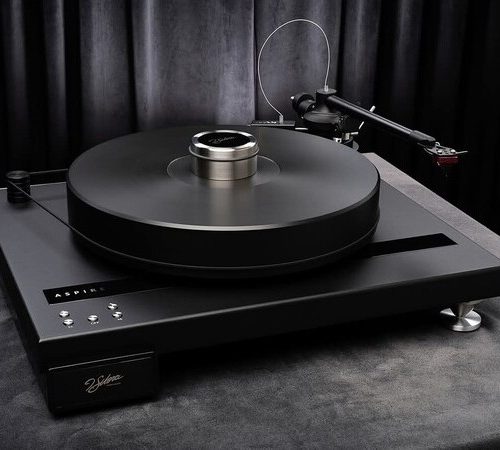 J.Sikora Turntables Aspire Linear p.s The ASPIRE turntable is the new entry point into the J.Sikora turntable line. Its construction retains the J.Sikora’s design philosophies and the trickle down of key technologies from the upper-end tables. The ASPIRE is characterized by exceptional speed stability, isolation from external resonances, and the sound that has made J.Sikora turntables so beloved around the world. It is now time to Step Up to a J.Sikora with the Aspire turntable. Aspire (deck only, including linear power supply)