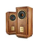 TANNOY STIRLING III LZ SE Special Edition model, homage to the Legendary III LZ first released in 1967 2 way floorstanding loudspeaker for medium to large sized rooms Dual Concentric driver technology provides class leading coherence and point source imaging 10″ highly efficient driver with 93 dB/Watt sensitivity and 500 Watt peak power handling to deliver breath-taking dynamics and realism Classic Pepperpot Waveguide and Alnico motor system to deliver a sweet, natural and inherently coherent sound. Aluminium-magnesium alloy diaphragm and Mylar surround compression driver delivers exceptional clarity and articulation throughout the high frequency range Sophisticated crossover network, featuring Tannoy customized capacitors, low loss laminated core inductors and thick film resistors, delivering a more natural and cohesive sound Front mounted control panel, houses 2 band energy control with boost and attenuation compensation for room design and tailoring to personal preference Tannoy customized bi-wire able binding posts to improve signal transmission and integrity Fifth binding post provides grounding to reduce radio frequency interference and improves midrange clarity Front firing Distributed Port system gives powerful and extended low frequency performance Handcrafted oiled walnut veneered cabinet, utilising high density particle board. Which provides extreme rigidity, to control low frequency performance Extensive bracing incorporating DMT (Differential Materials Technology) to couple drivers to cabinets Precision machined, gold anodised aluminium Special Edition adjustment panel and metal trim complements the aesthetic of the real wood cabinet Specially formulated Prestige wood wax provided to keep cabinet in pristine condition Tannoy – Around 100 years of British sound heritage and innovation